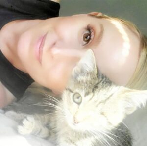 blonde woman with kitten
